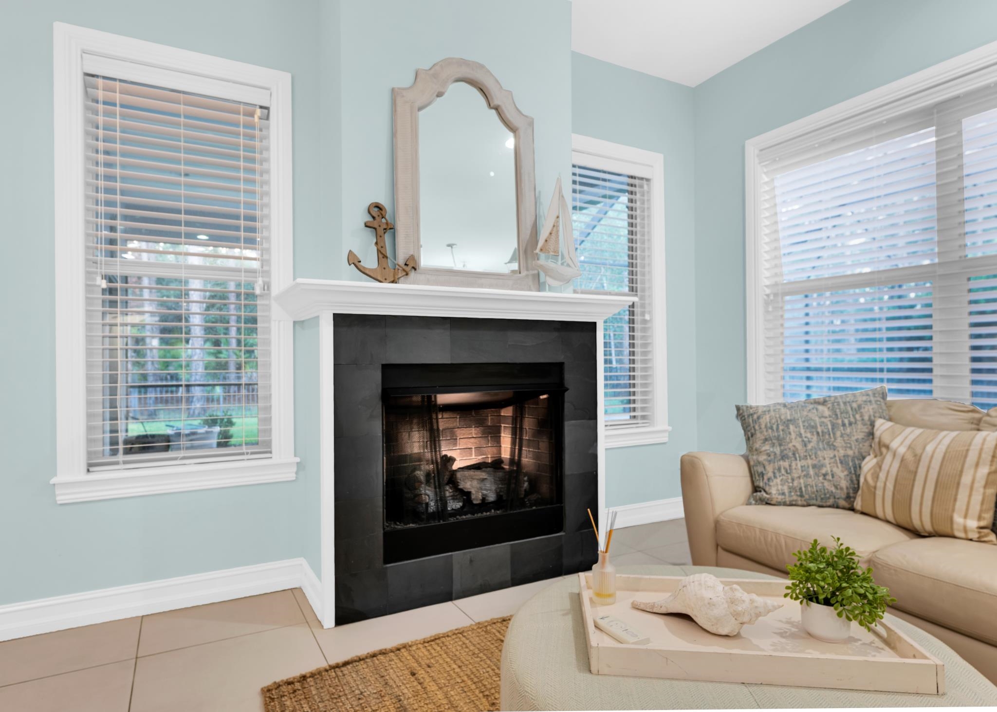 113 Needle Palm Drive St. Augustine, FL 32086 - Photo 21 of 46 a living room with furniture and a fireplace