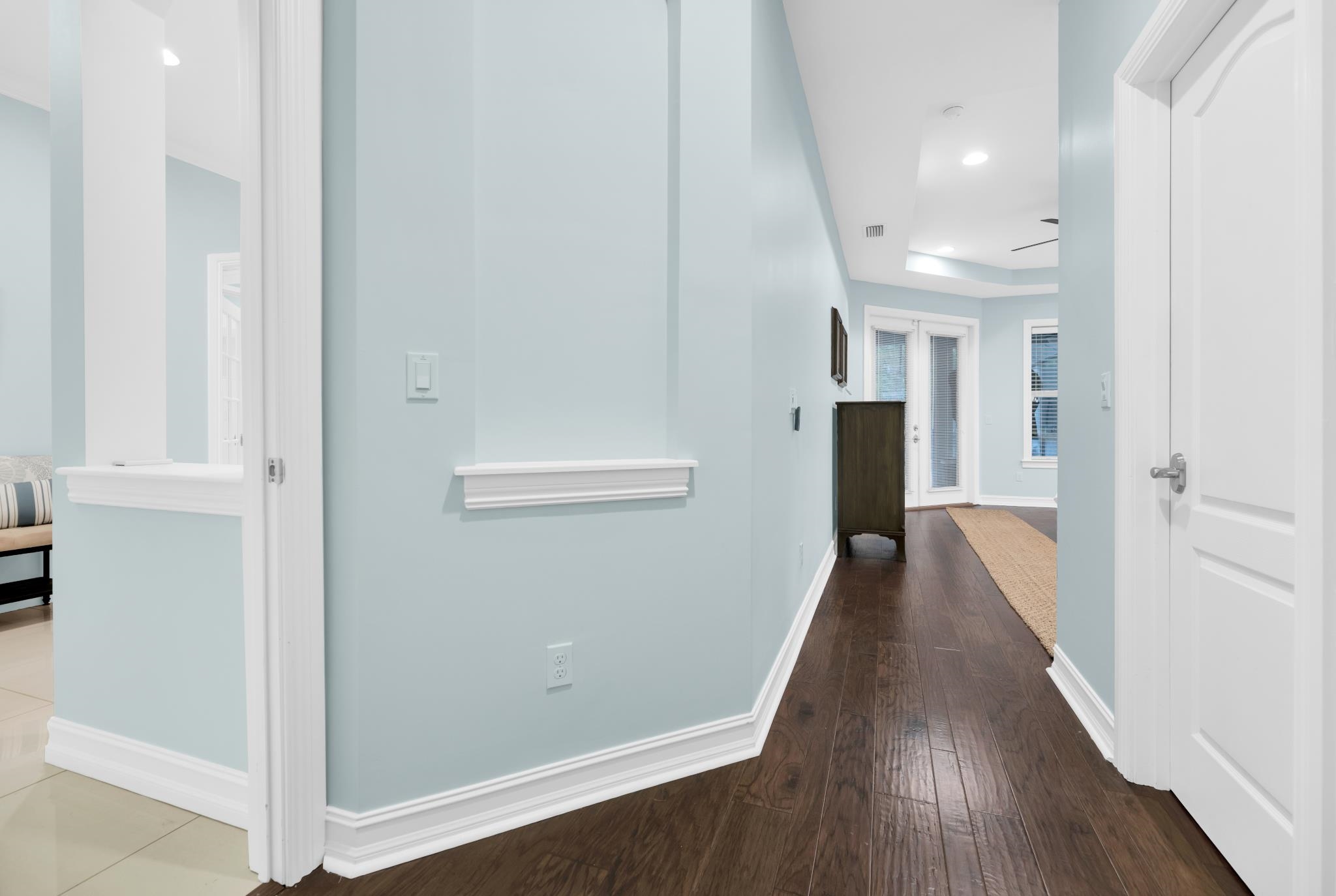 113 Needle Palm Drive St. Augustine, FL 32086 - Photo 25 of 46 wooden floor in a hall with an entryway