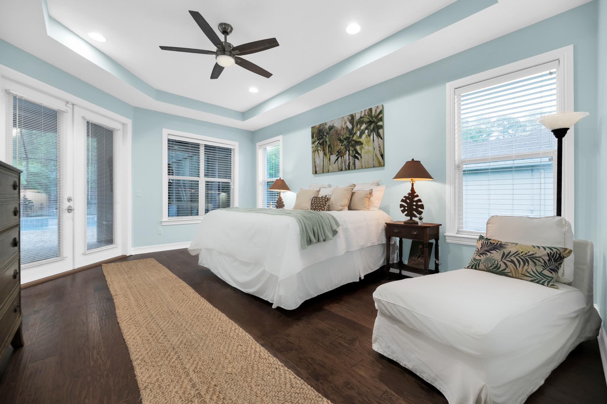 113 Needle Palm Drive St. Augustine, FL 32086 - Photo 26 of 46 a bedroom with two beds and a large window with wooden floor