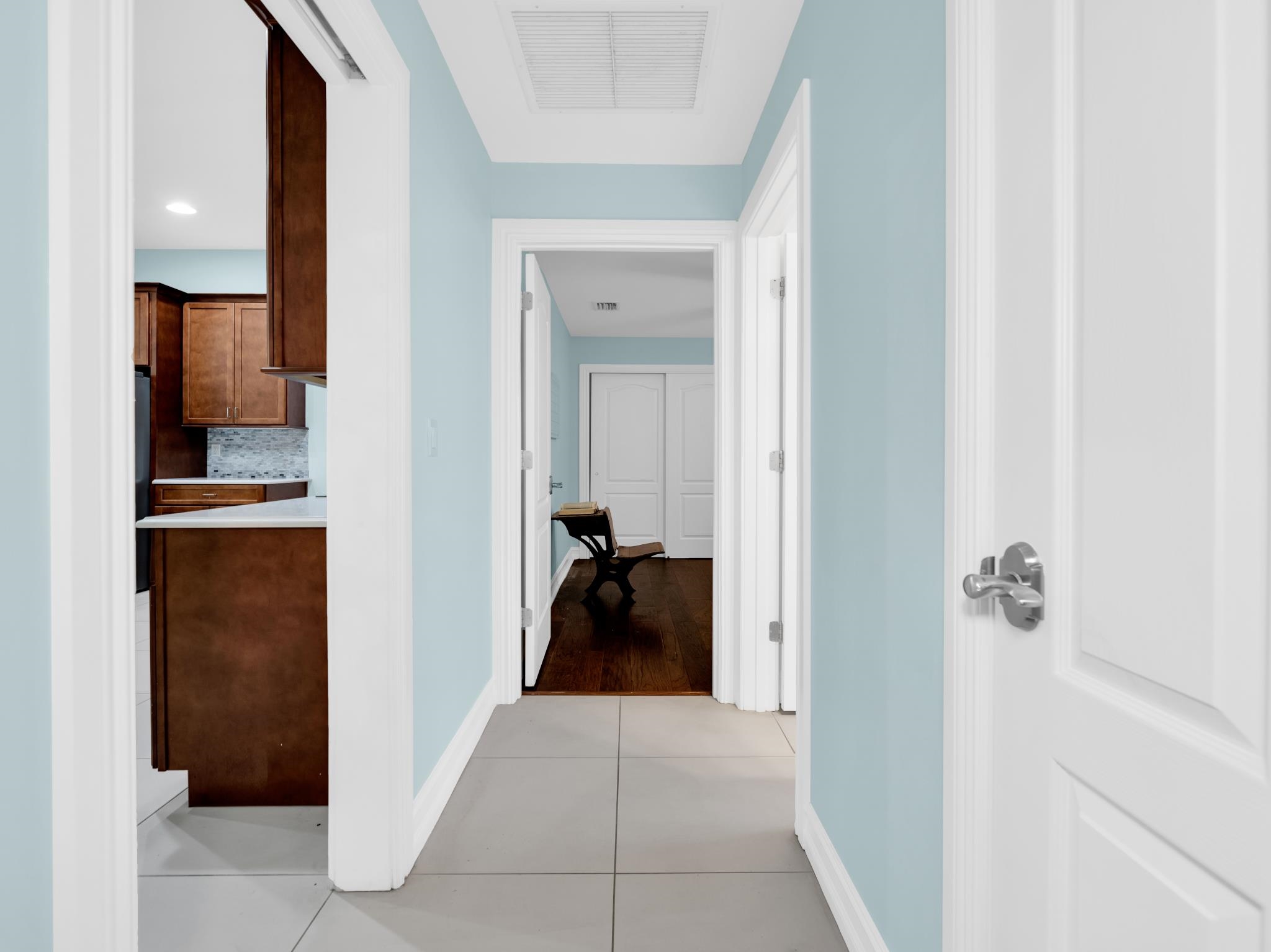 113 Needle Palm Drive St. Augustine, FL 32086 - Photo 32 of 46 a view of a hallway with closet and a living room
