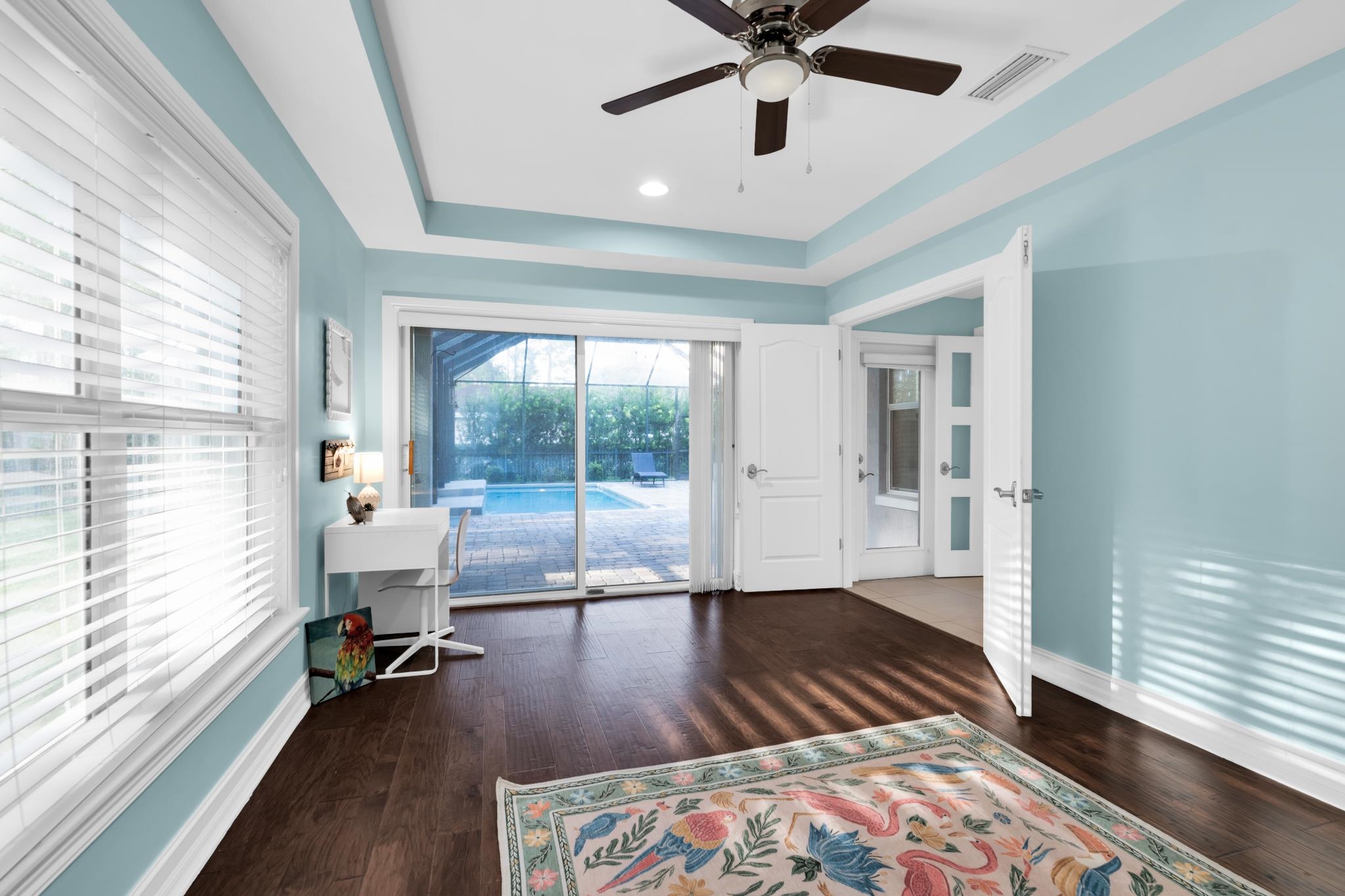 113 Needle Palm Drive St. Augustine, FL 32086 - Photo 39 of 46 a living room with hardwood floor and a large window