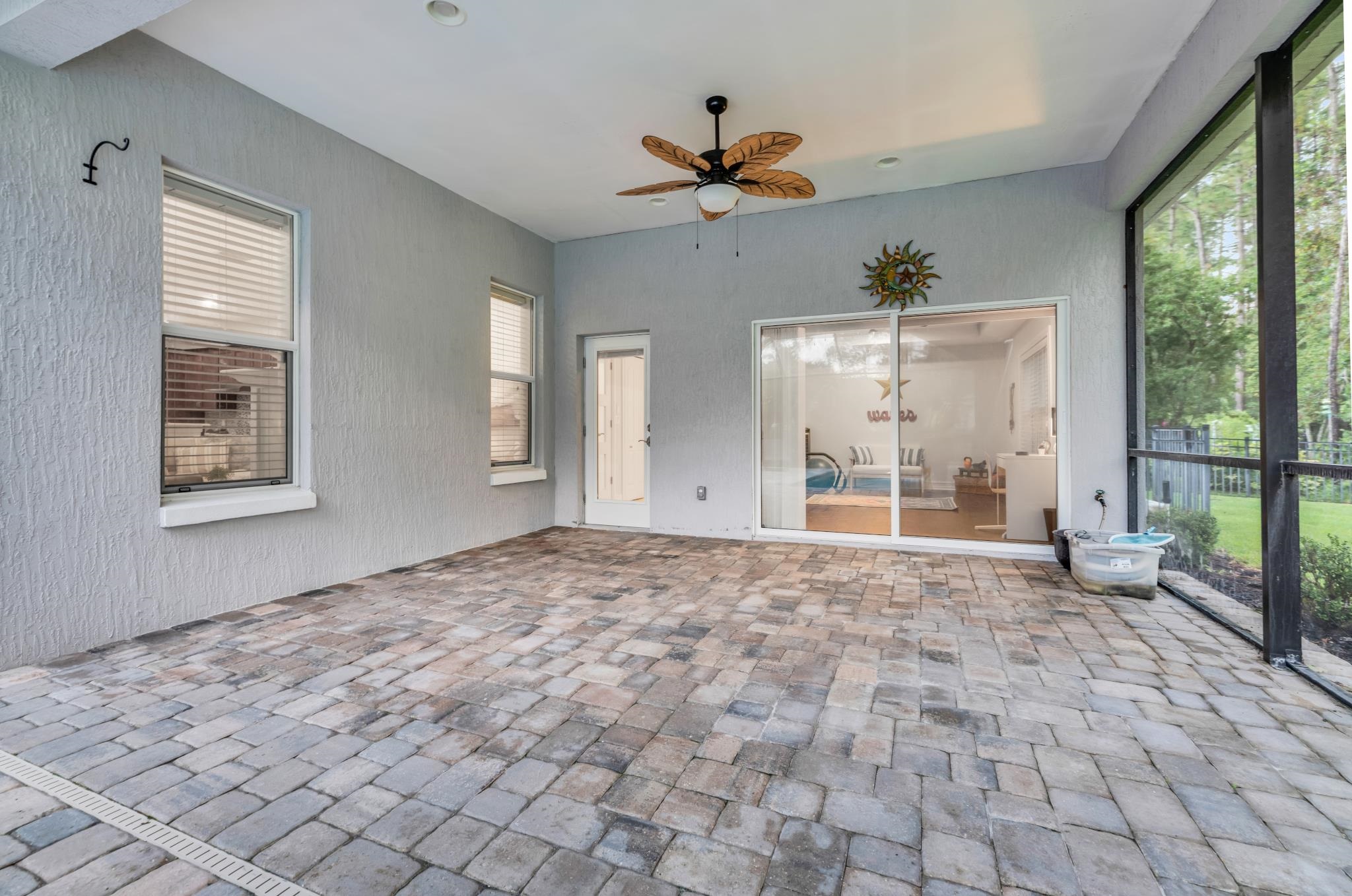 113 Needle Palm Drive St. Augustine, FL 32086 - Photo 43 of 46 a view of an empty room and window ceiling fan