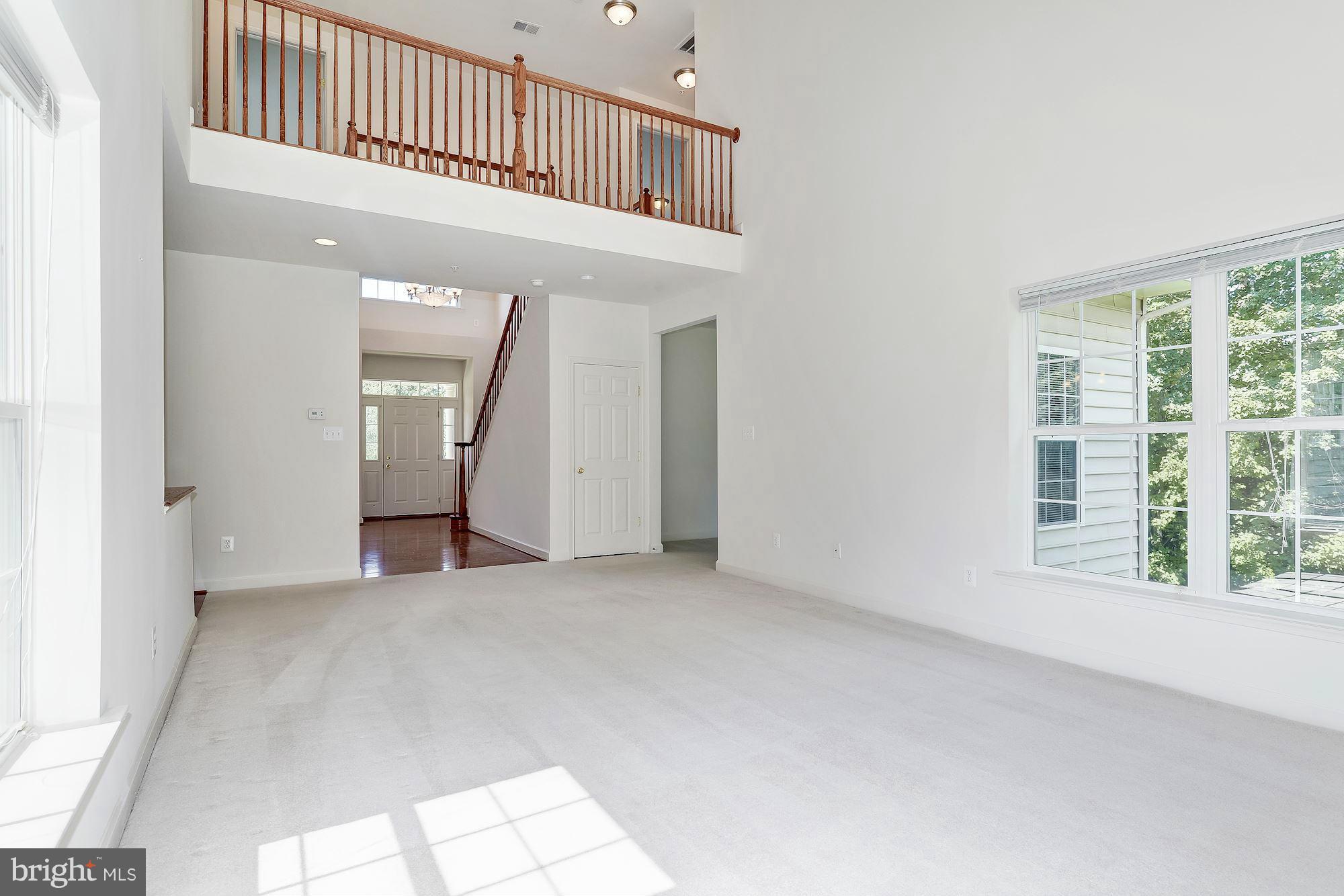 9700 Hickory Spring Lane Gaithersburg, MD 20882 - Photo 12 of 21 an empty room with windows