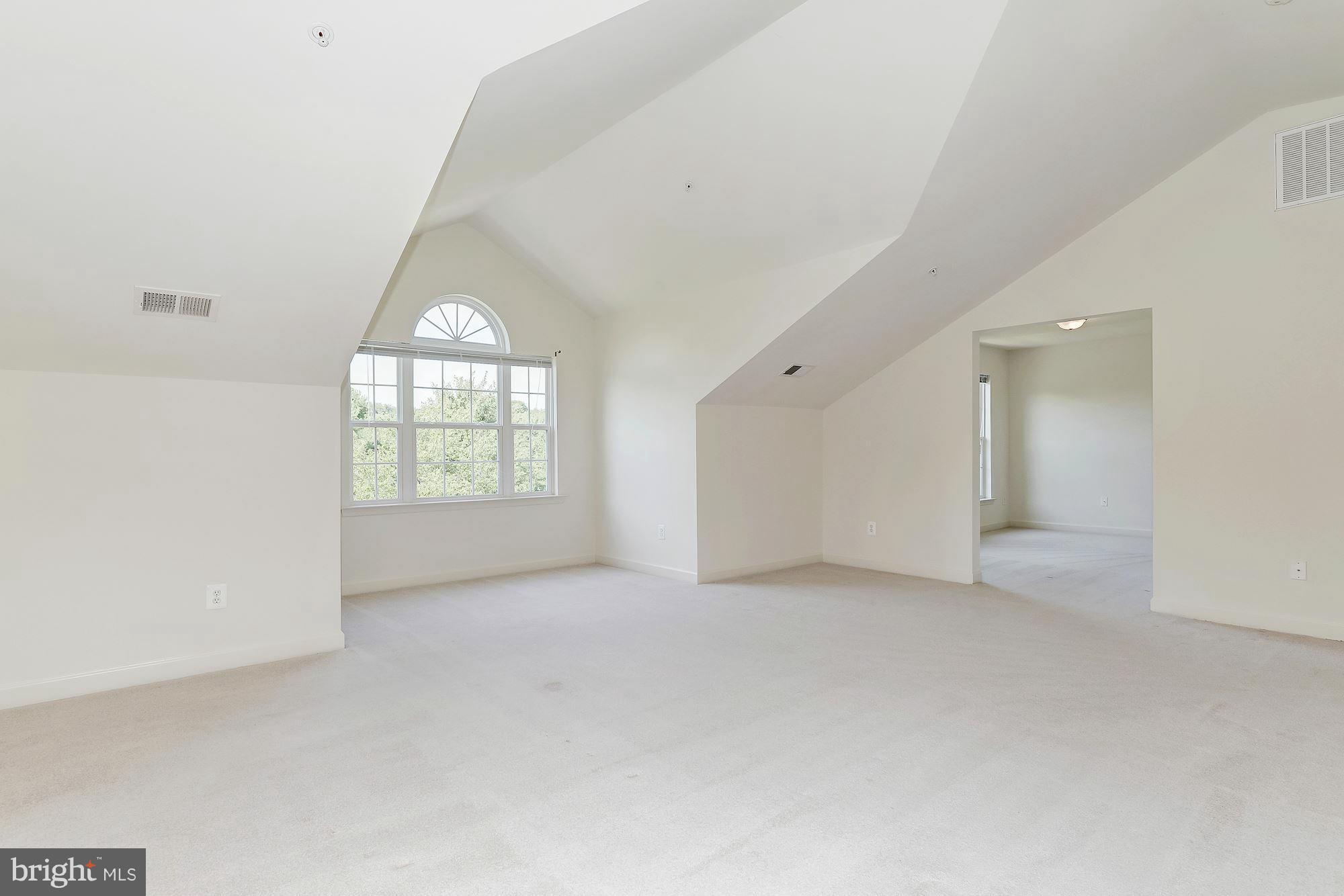 9700 Hickory Spring Lane Gaithersburg, MD 20882 - Photo 13 of 21 an empty room with windows and closet