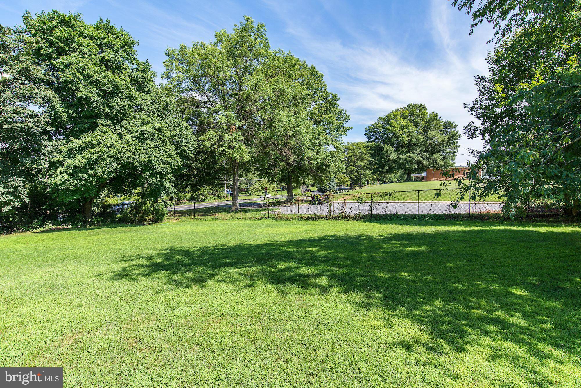 9700 Hickory Spring Lane Gaithersburg, MD 20882 - Photo 20 of 21 a view of a park with large trees