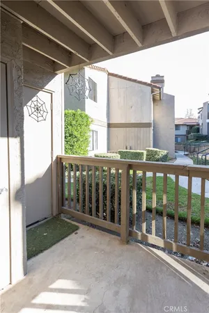 a view of a two chair in the patio
