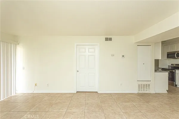 a view of a kitchen with a sink