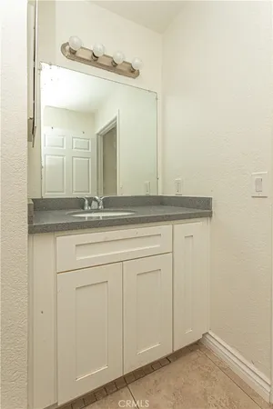 a sink with a mirror