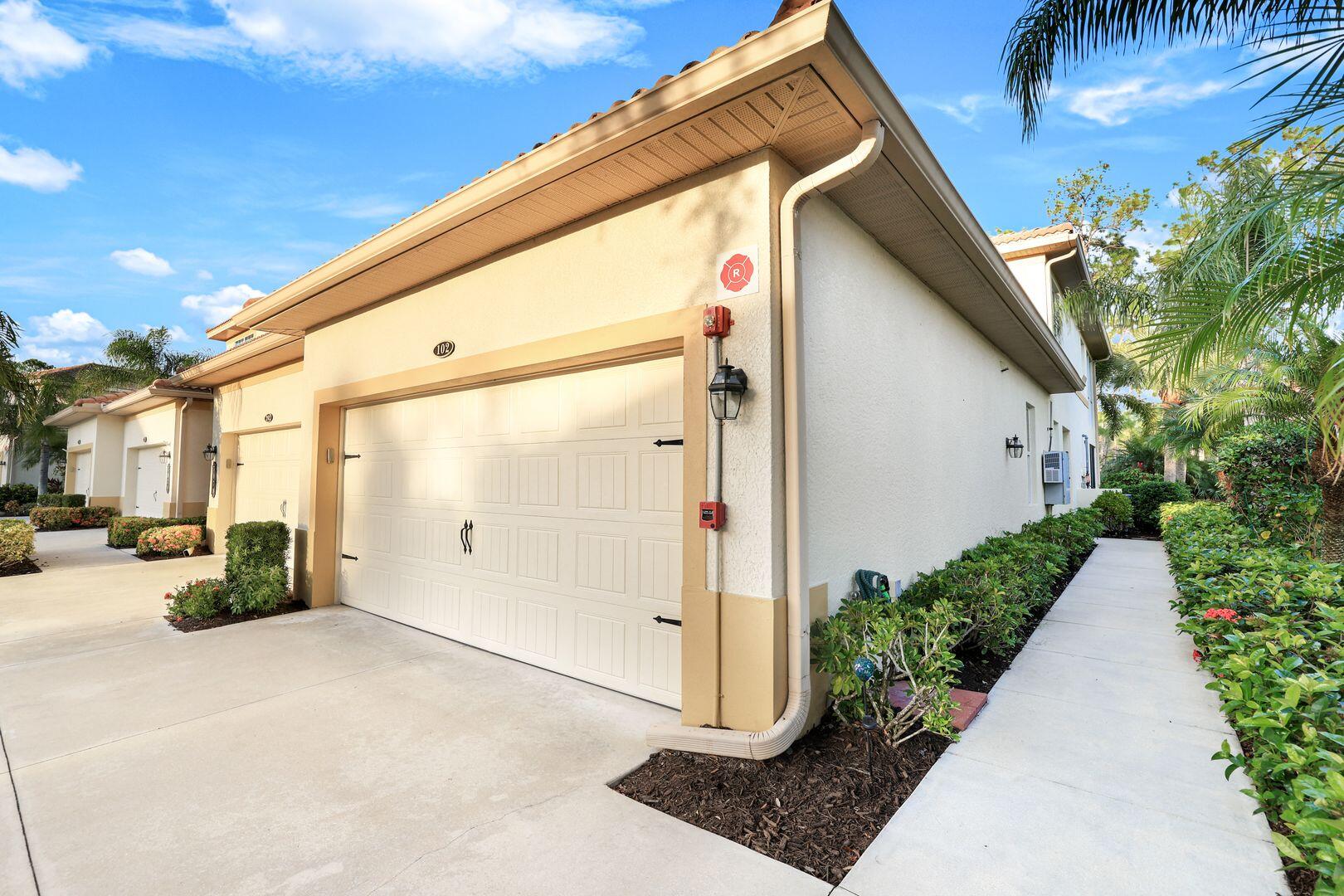 7878 Clemson Street, Unit 102 Naples, FL 34104 - Photo 15 of 20 a view of a porch with patio