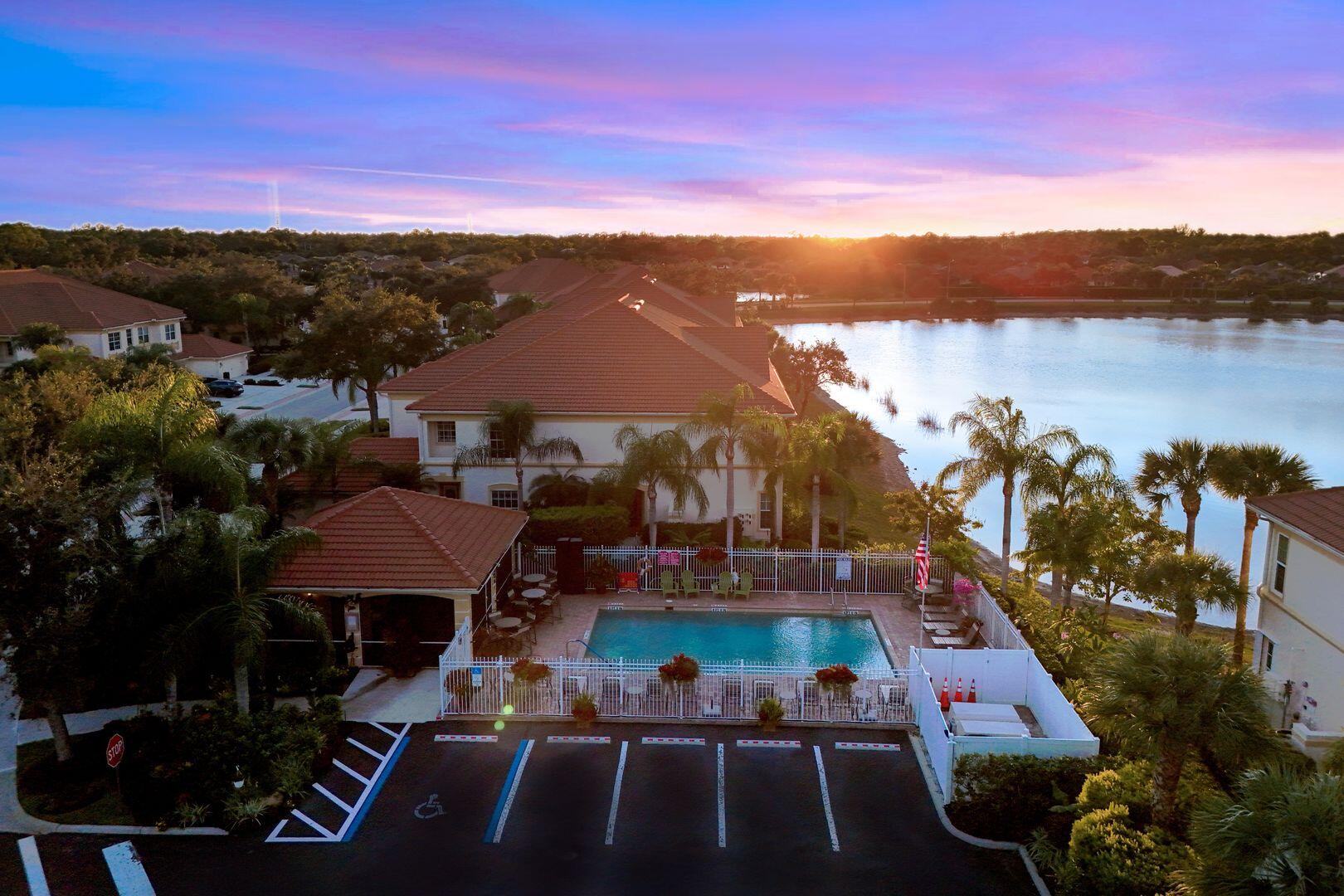 7878 Clemson Street, Unit 102 Naples, FL 34104 - Photo 7 of 20 a view of houses with outdoor space and river