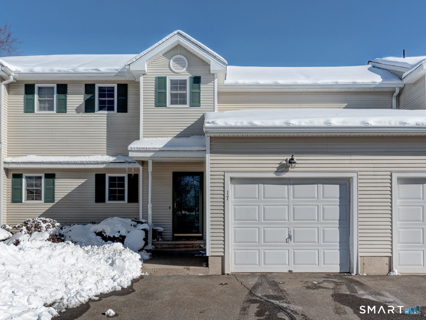 962 South Main Street, Unit 17 Southington, CT 06479 - Photo 1 of 1 a front view of a house with a yard