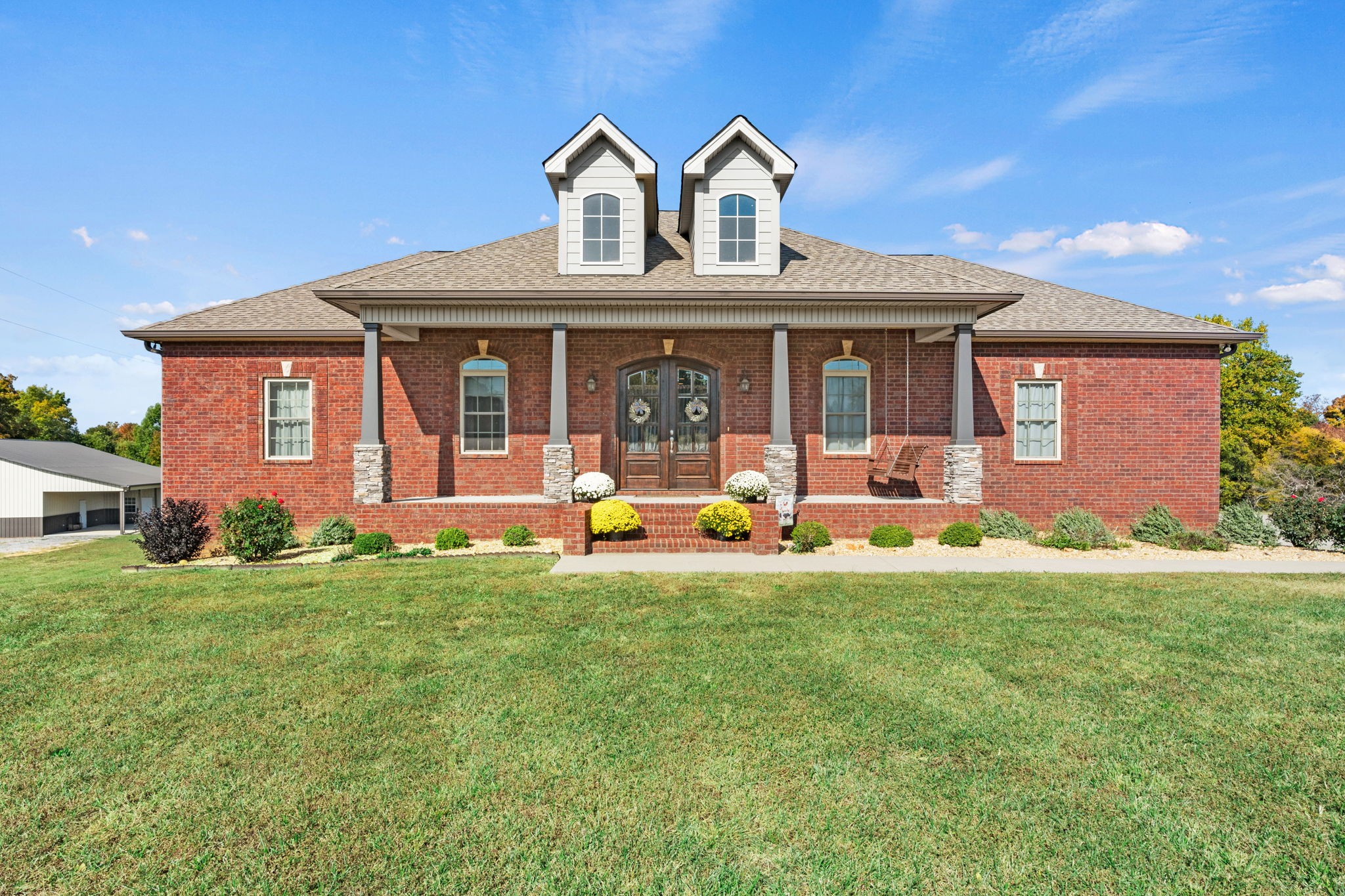 4600 Benson Road Springfield, TN 37172 - Photo 1 of 64 a front view of a house with garden