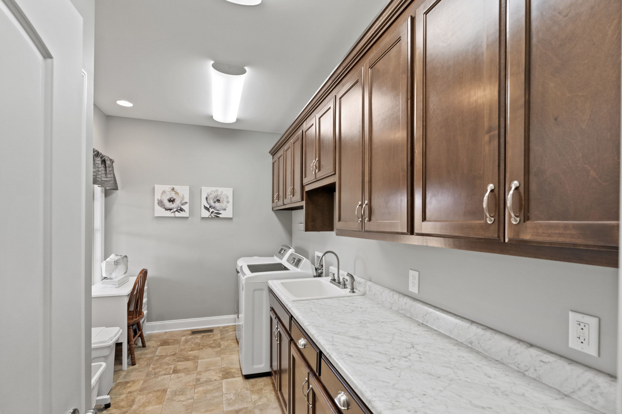 4600 Benson Road Springfield, TN 37172 - Photo 31 of 64 a bathroom with a granite countertop sink a toilet and a mirror
