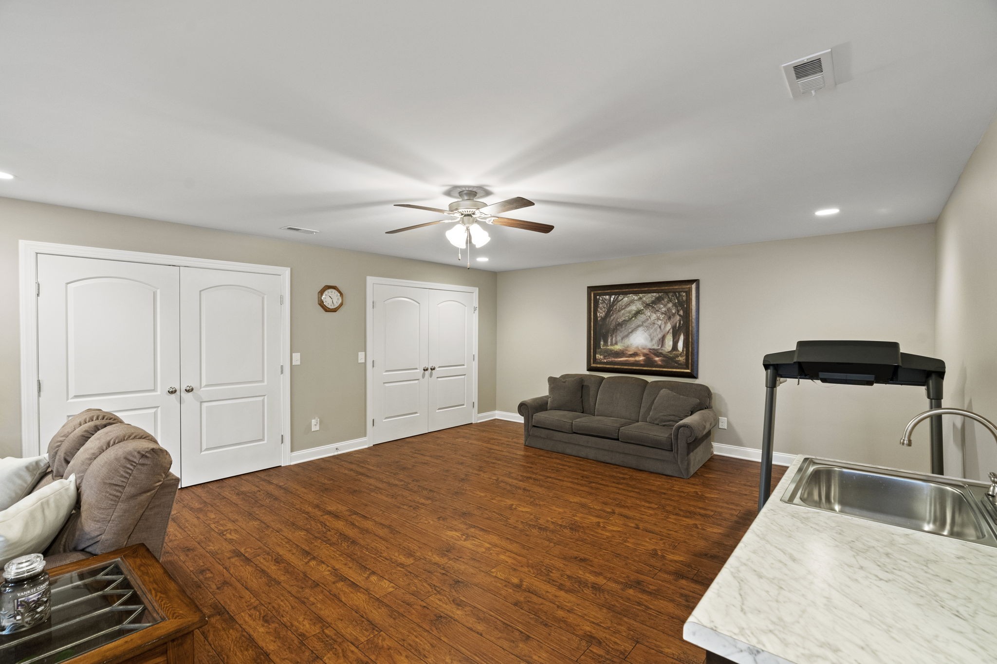 4600 Benson Road Springfield, TN 37172 - Photo 40 of 64 a bedroom with a bed and couch