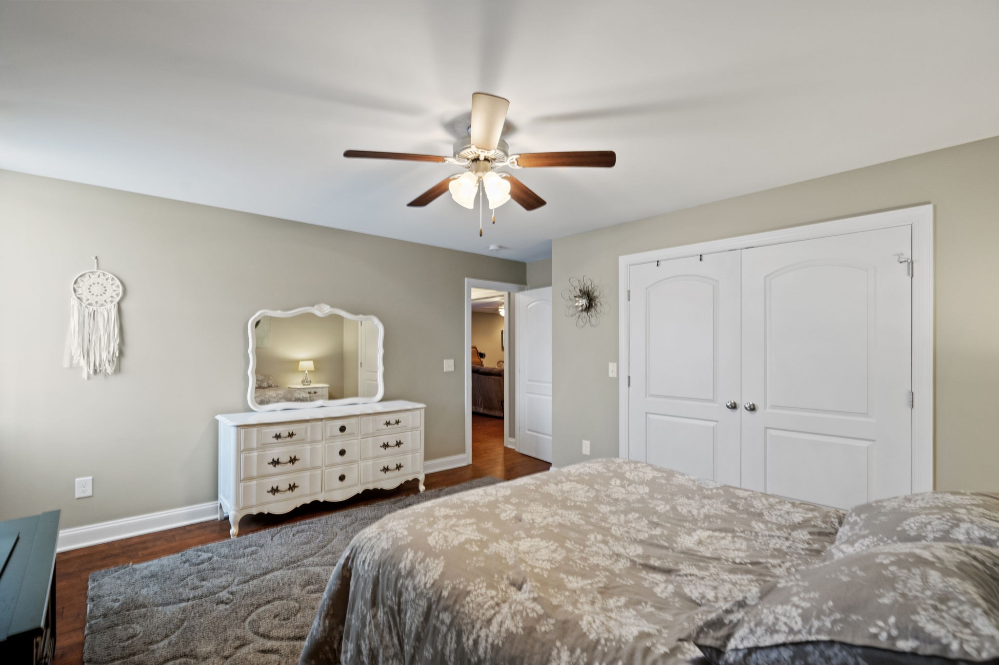 4600 Benson Road Springfield, TN 37172 - Photo 45 of 64 a bedroom with a bed and a chandelier