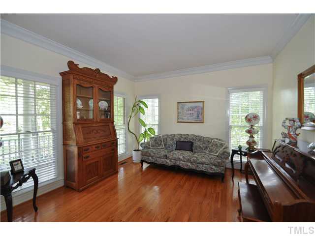 1805 Liatris Lane Raleigh, NC 27613 - Photo 2 of 25 Gorgeous formal living room with gleaming hardwood floors and elegant detailing. Tons of windows for natural lighting