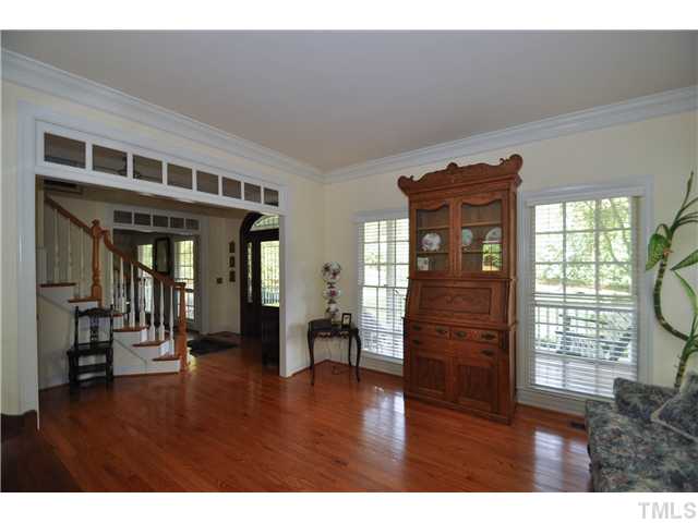 1805 Liatris Lane Raleigh, NC 27613 - Photo 3 of 25 Gorgeous formal living room with gleaming hardwood floors and elegant detailing. Tons of windows for natural lighting