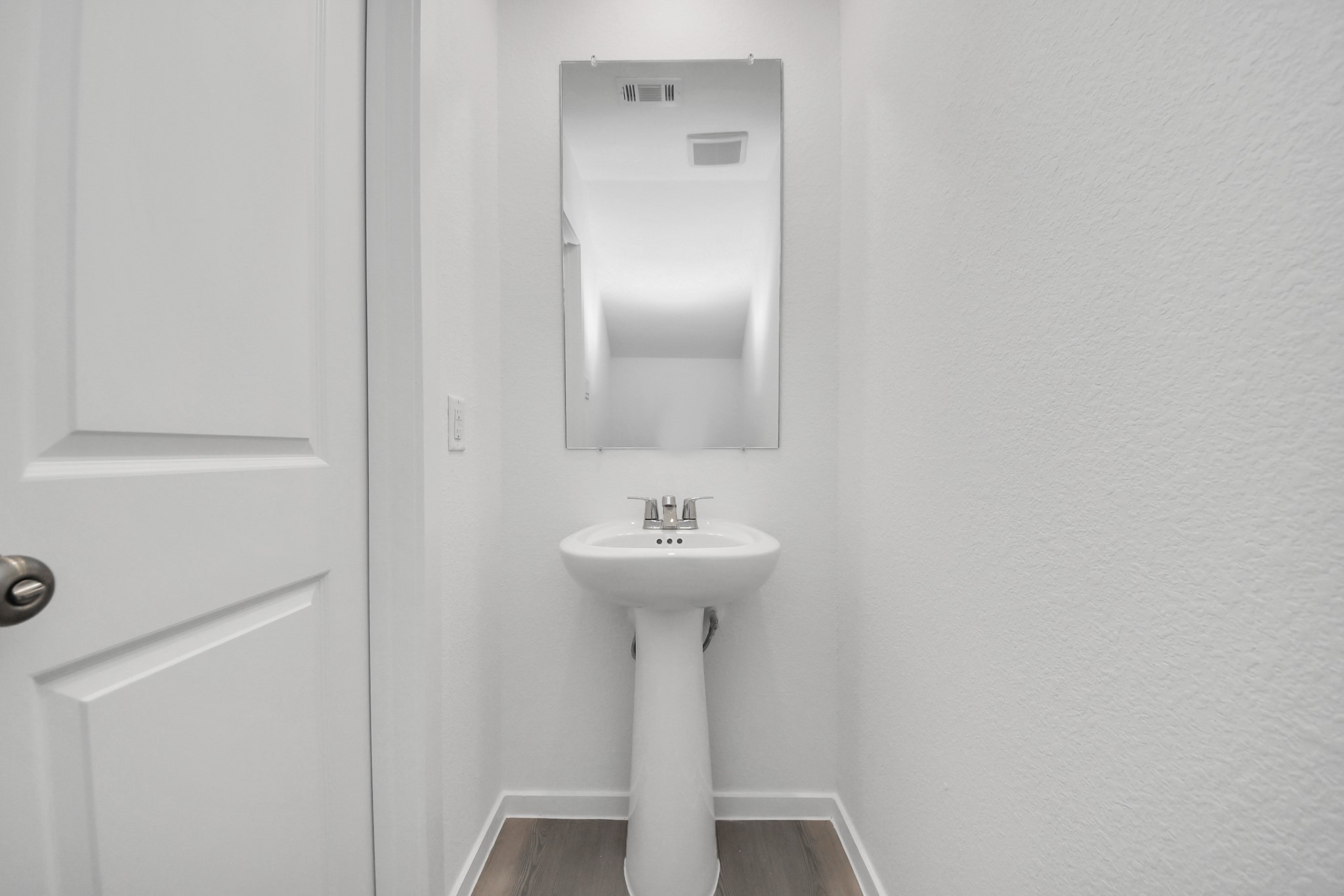 2931 Summer Breeze Way Angleton, TX 77515 - Photo 9 of 30 a bathroom with a sink and a mirror