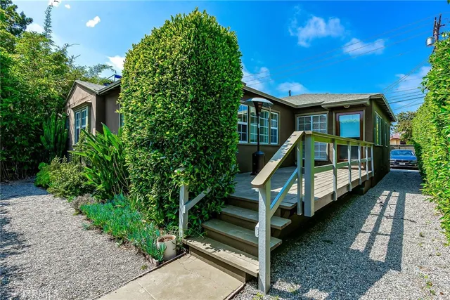 a house view with a garden space