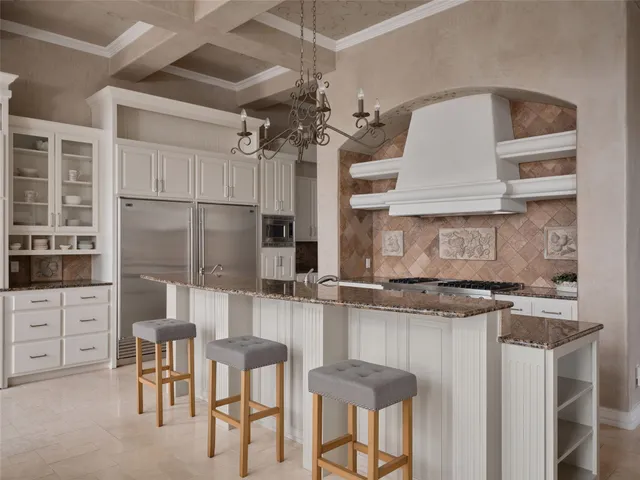 a bedroom with a bed and a fireplace