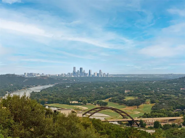 an aerial view of residential building and trees