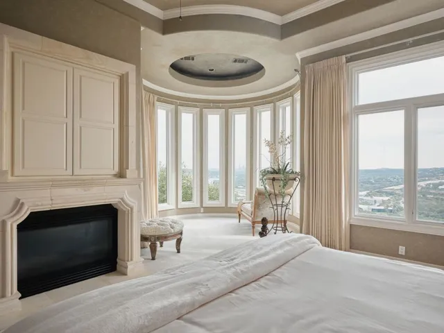 a bath tub sitting in a bathroom next to a window