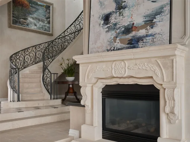 an aerial view of residential building and ocean view