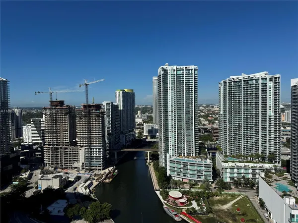 a view of a city skyline from a balcony