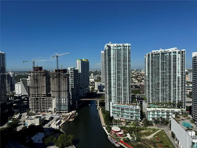 a view of a city skyline from a balcony