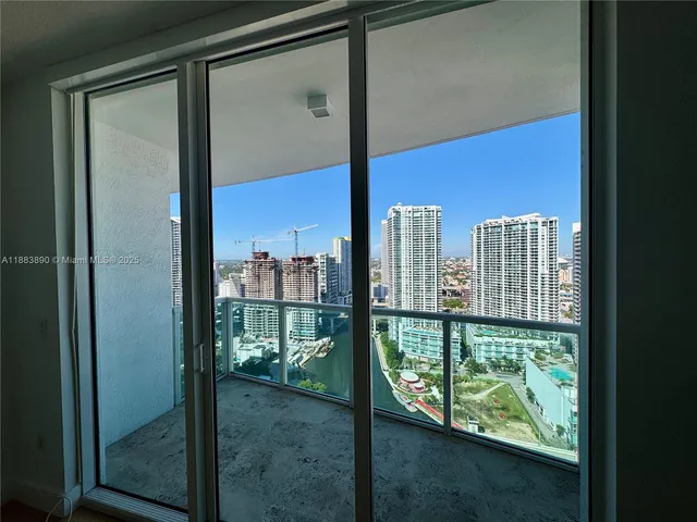 a view of a city with tall buildings