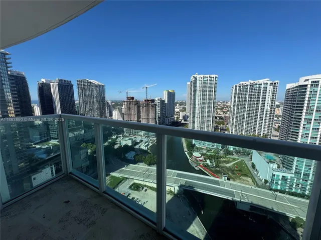 a view of a balcony with city view