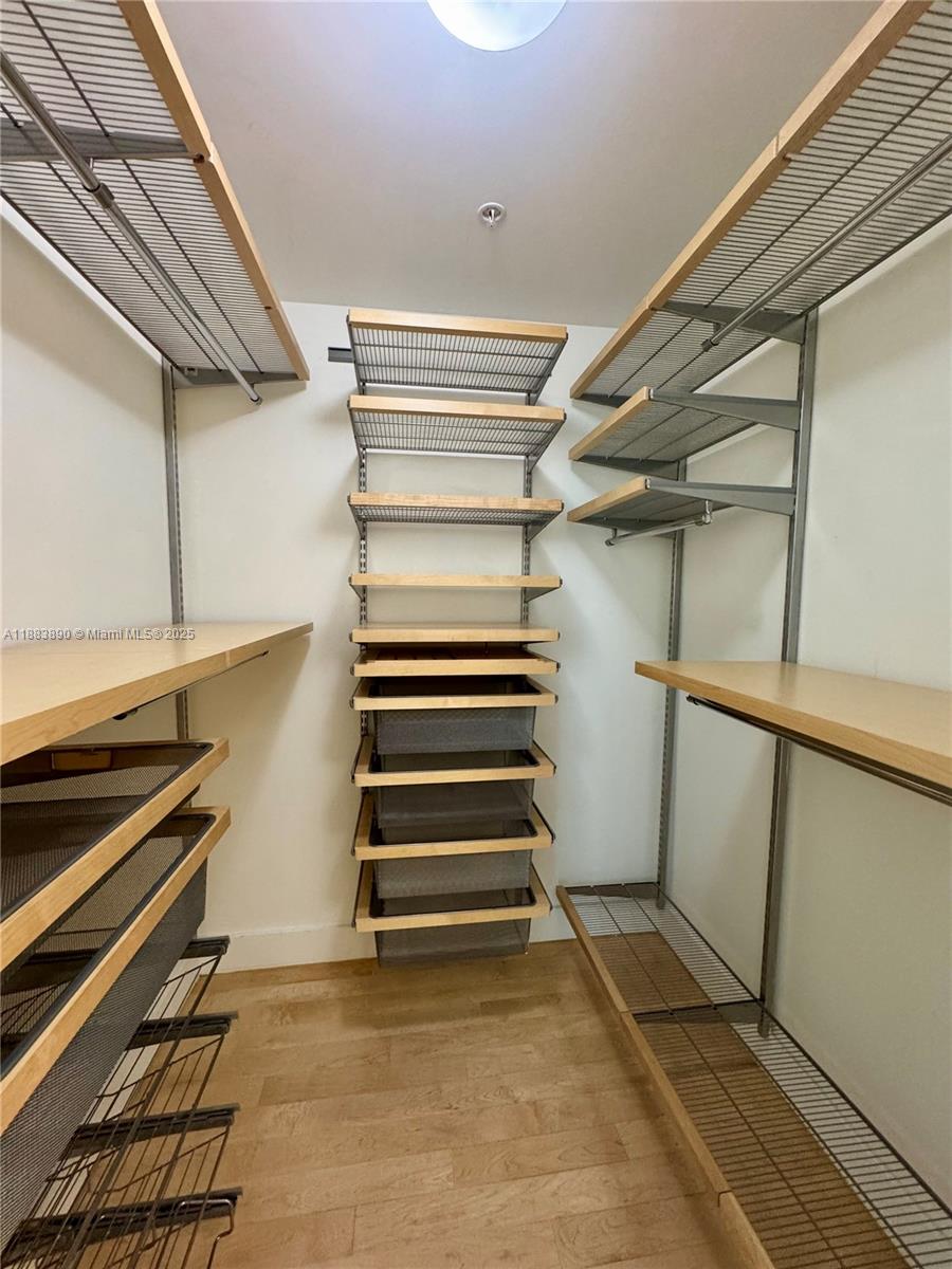 31 Southeast 5th Street, Unit 3817 Miami, FL 33131 - Photo 25 of 26 a view of an empty room with stairs