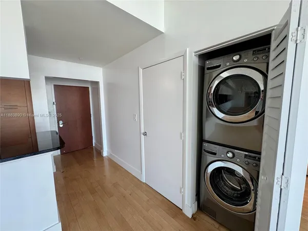 a view of a storage & utility room with washer and dryer