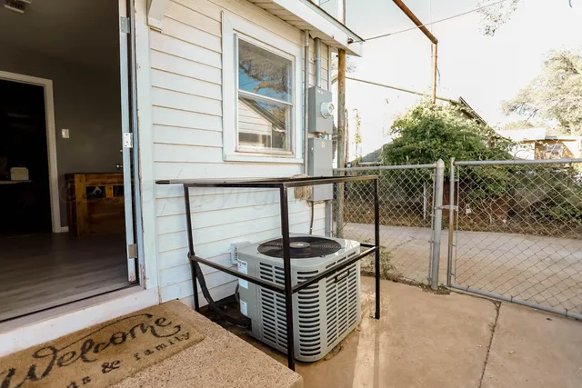 a bathroom with a shower and a sink