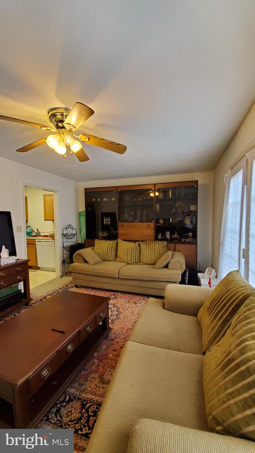 336 Ritenour Street Front Royal, VA 22630 - Photo 3 of 11 Welcoming Living Room with Rear Entrance