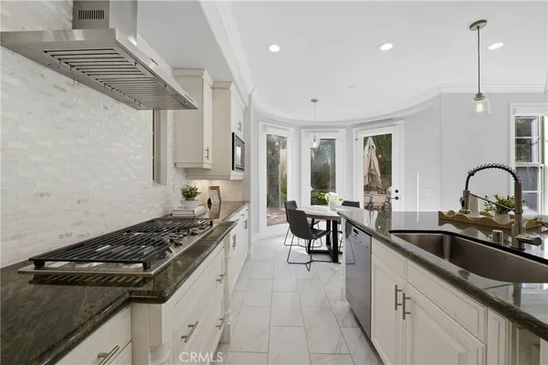 a living room with furniture fireplace and flat screen tv