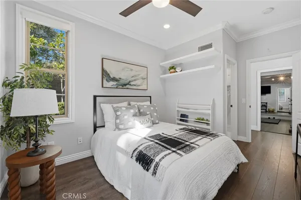 a bedroom with a bed and closet