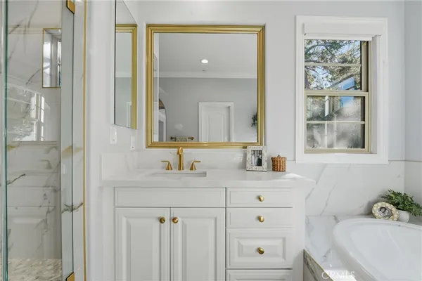 a room with gym equipment and a flat screen tv