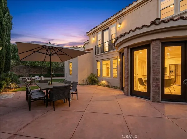 a view of a building with car parked