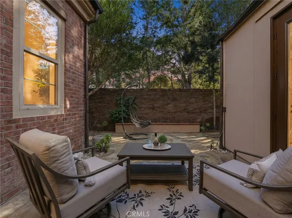a view of a lounge chairs in the patio