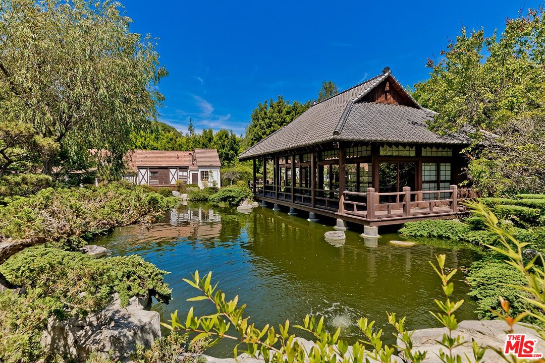 205 Ladera Drive Los Angeles, CA 90210 - Photo 3 of 10 a view of a house with swimming pool