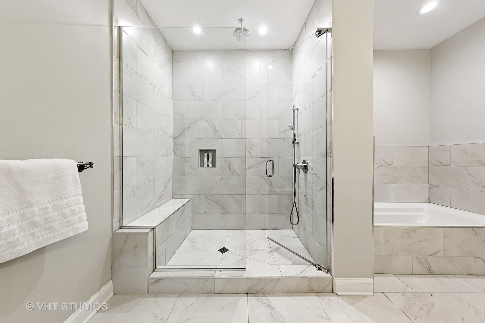 955 West Monroe Street, Unit 2C Chicago, IL 60607 - Photo 11 of 23 a bathroom with a shower and a tub