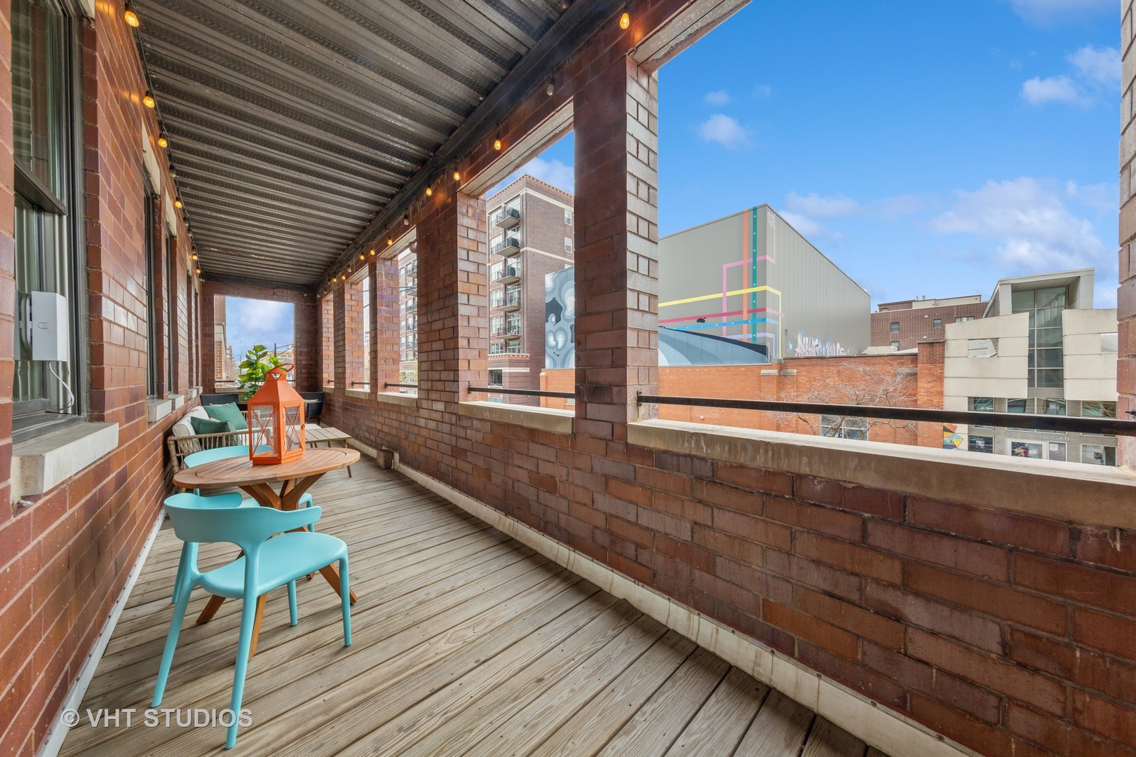 955 West Monroe Street, Unit 2C Chicago, IL 60607 - Photo 18 of 23 a porch with wooden floor
