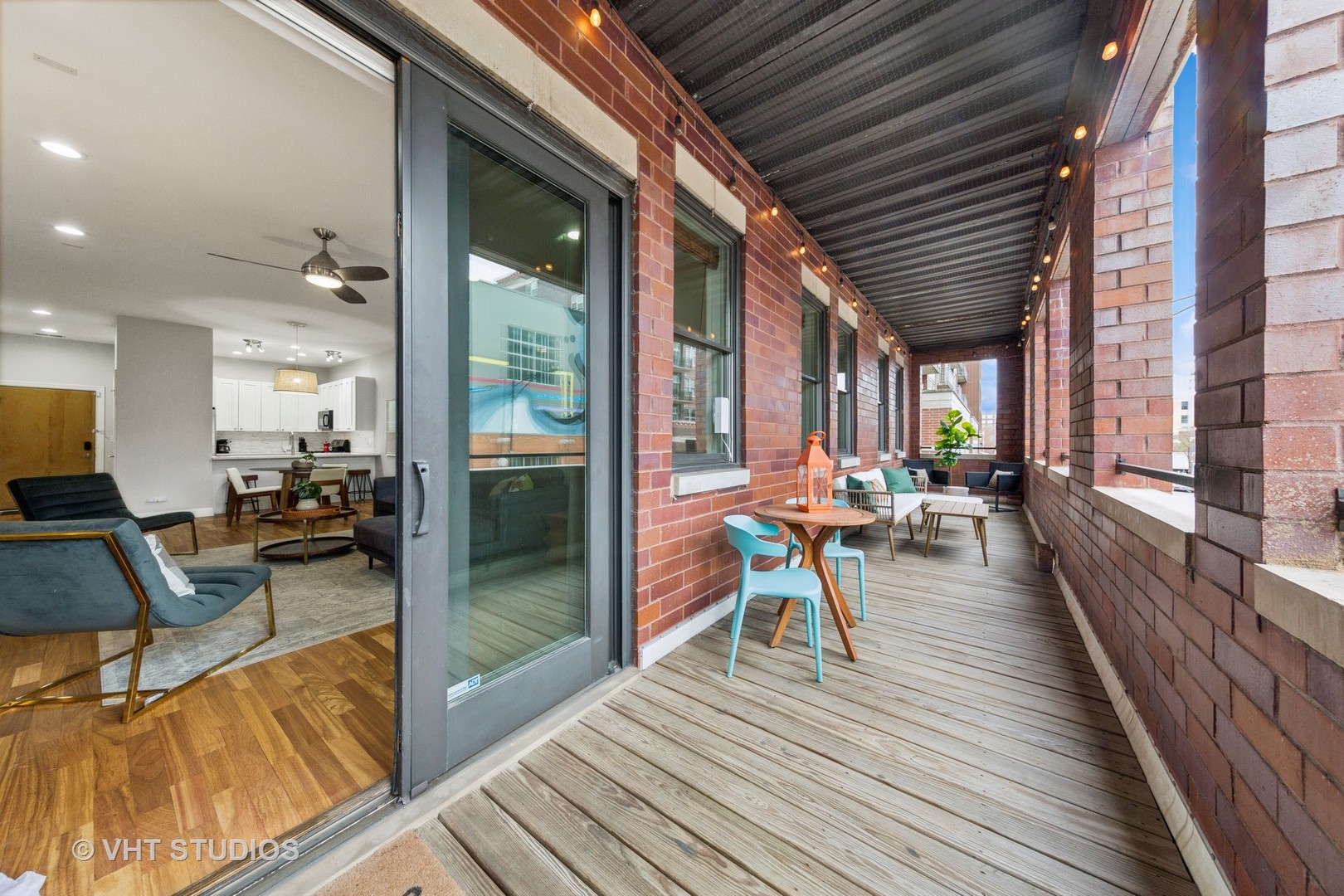 955 West Monroe Street, Unit 2C Chicago, IL 60607 - Photo 19 of 23 a view of a patio with swimming pool table chairs and a barbeque