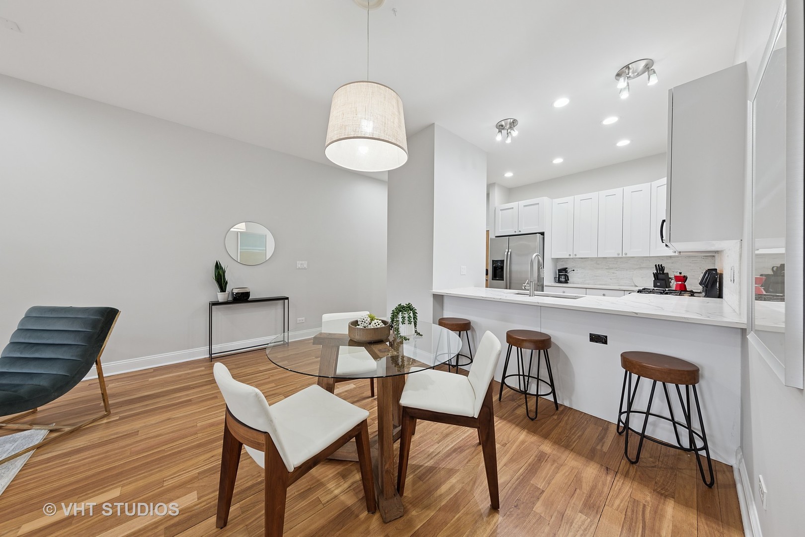 955 West Monroe Street, Unit 2C Chicago, IL 60607 - Photo 7 of 23 a view of kitchen with cabinets table and chairs