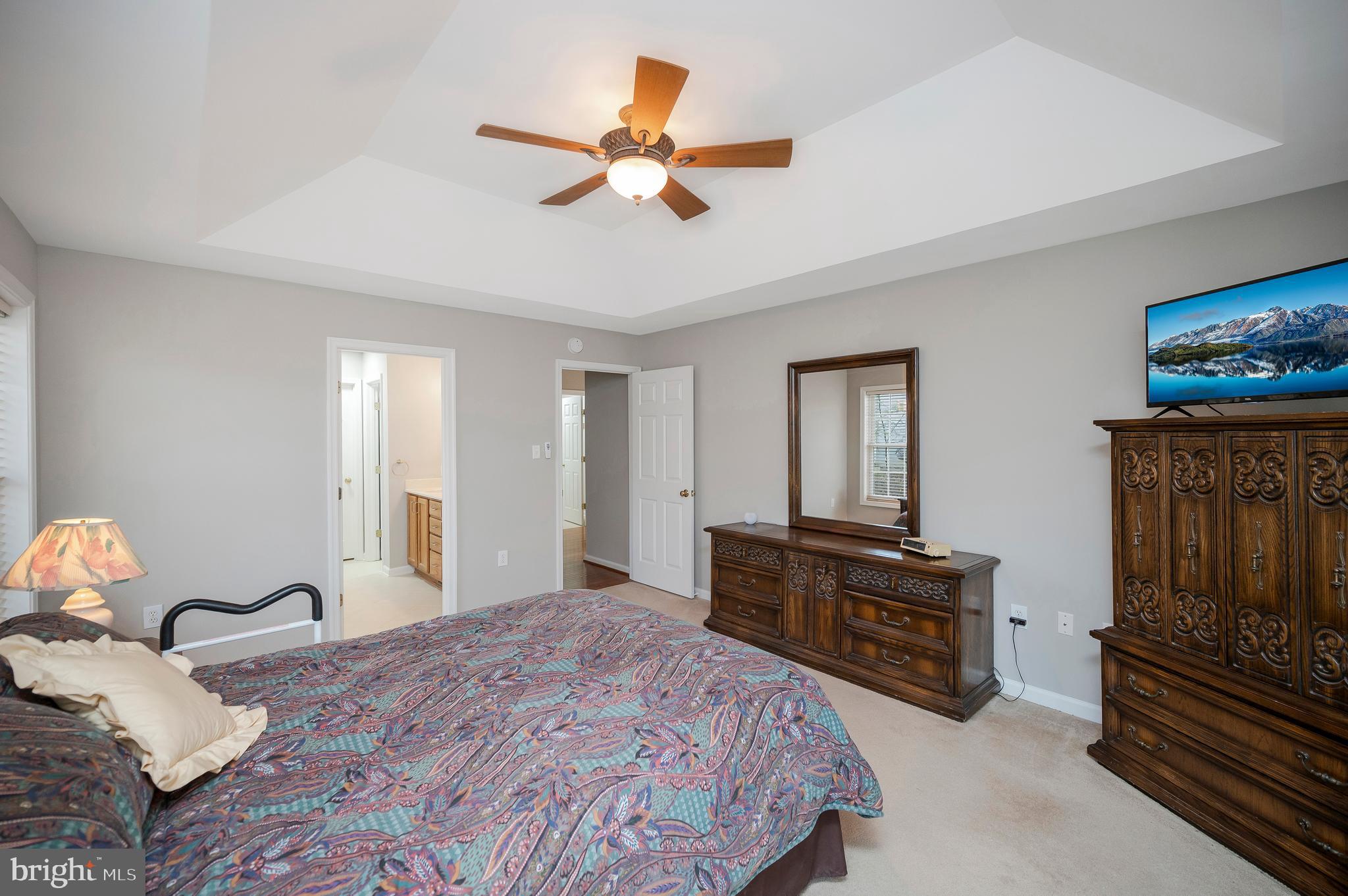 550 Harrison Circle Locust Grove, VA 22508 - Photo 15 of 39 Spacious primary with carpet and en suite bath.