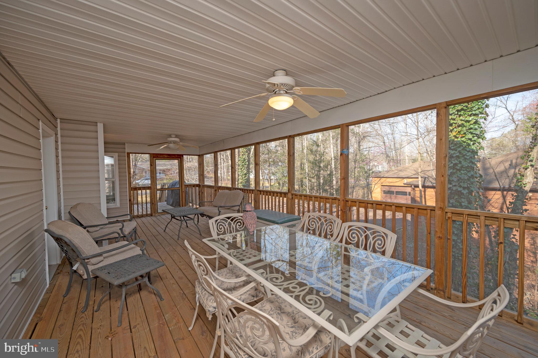 550 Harrison Circle Locust Grove, VA 22508 - Photo 23 of 39 Relax and unwind on the screened porch.