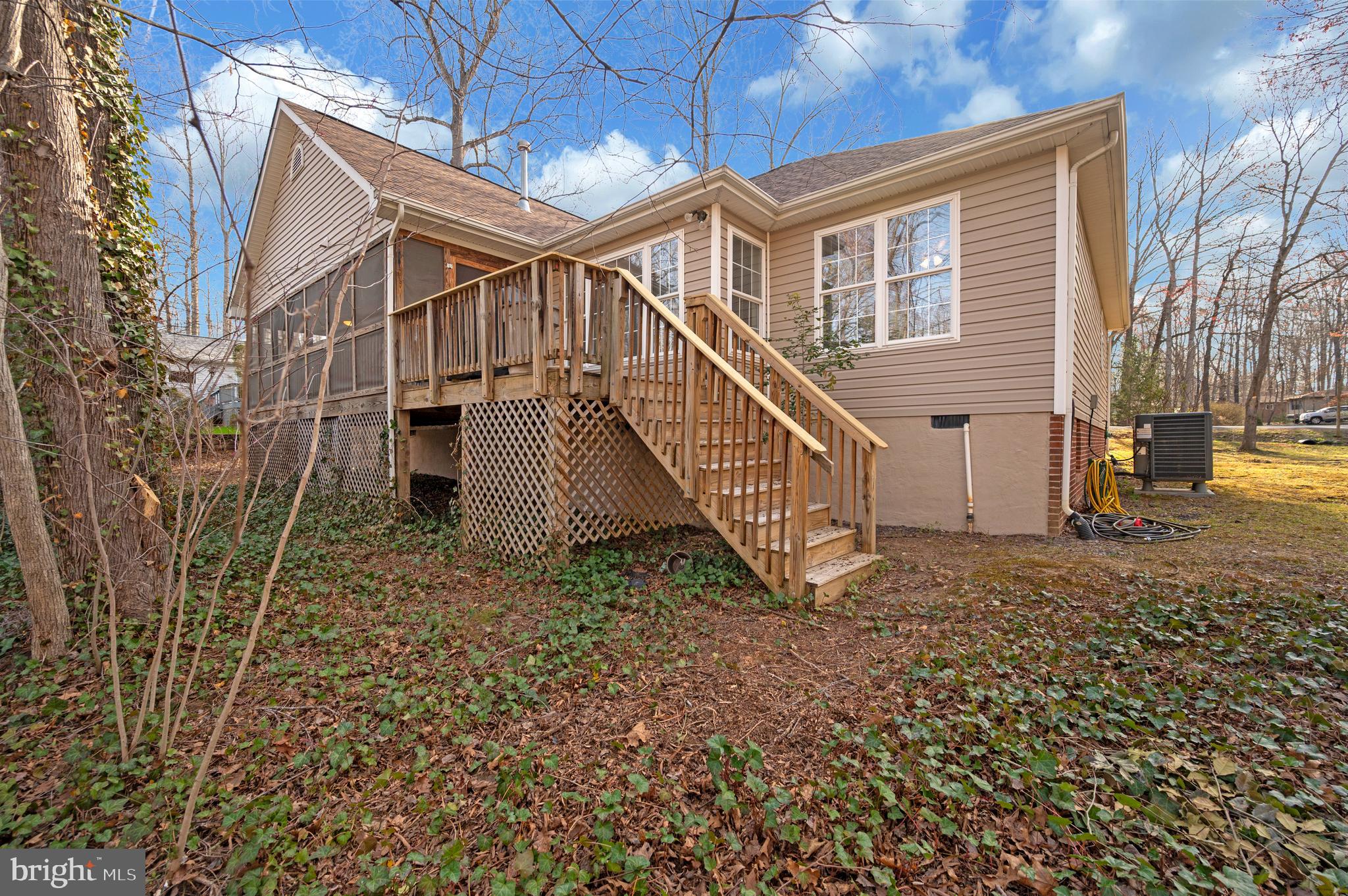 550 Harrison Circle Locust Grove, VA 22508 - Photo 26 of 39 From deck to yard, every step feels like home