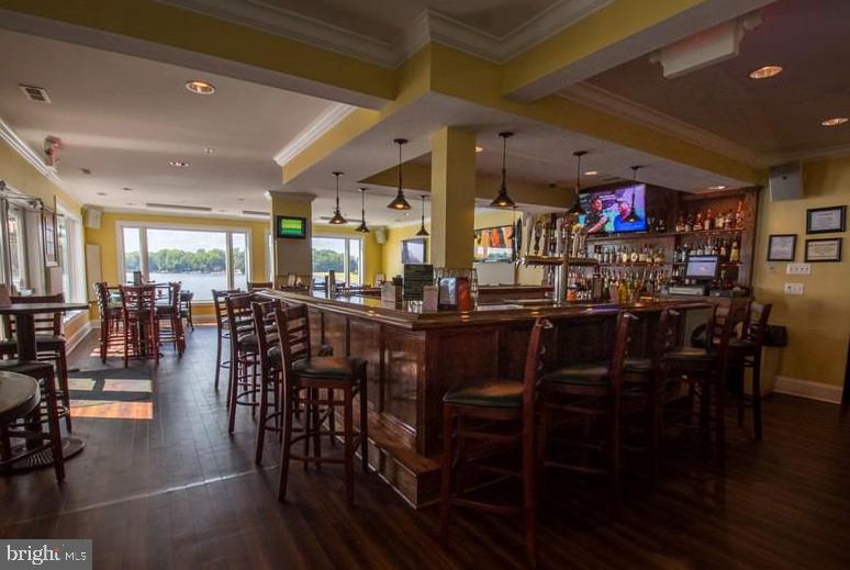 550 Harrison Circle Locust Grove, VA 22508 - Photo 30 of 39 Meet friends for a drink at the clubhouse lounge.