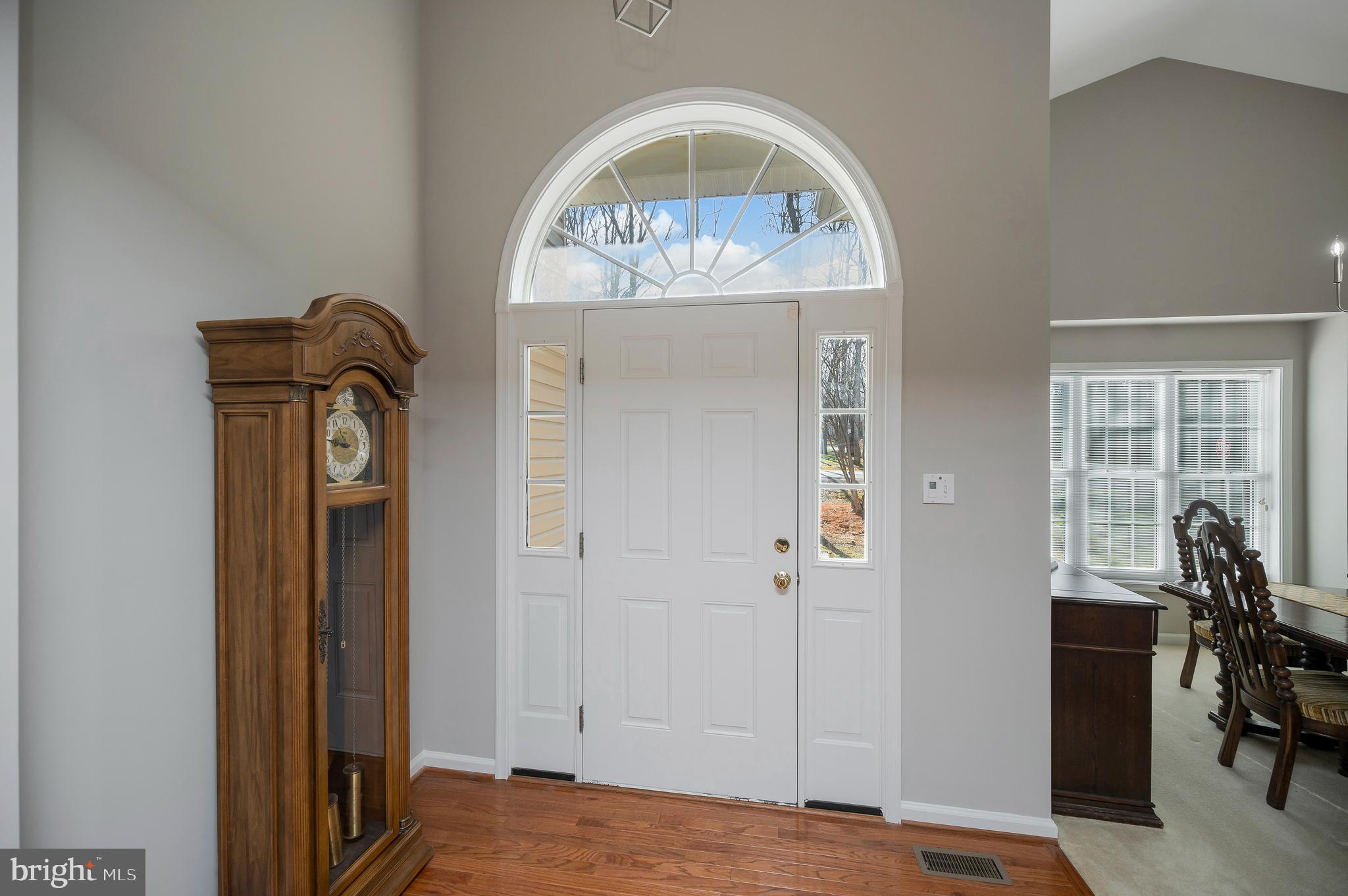 550 Harrison Circle Locust Grove, VA 22508 - Photo 4 of 39 Hardwood floors welcome you inside the foyer.